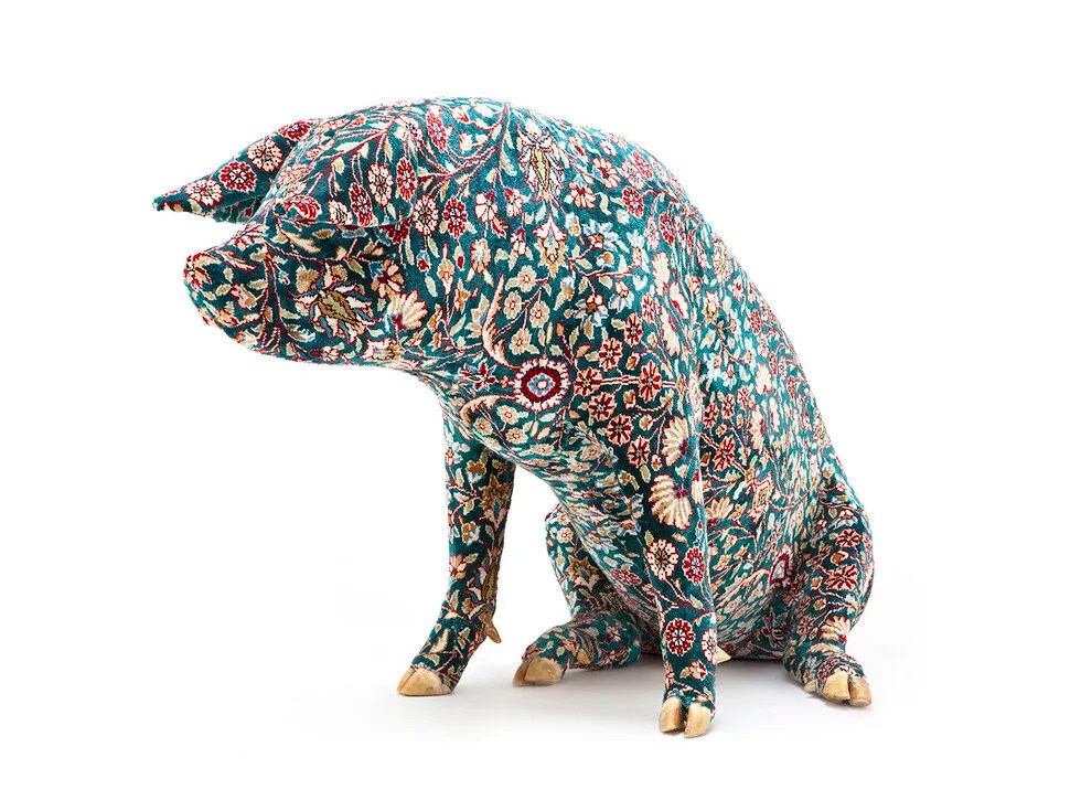 Love his series of pigs decorated like Persian rugs .